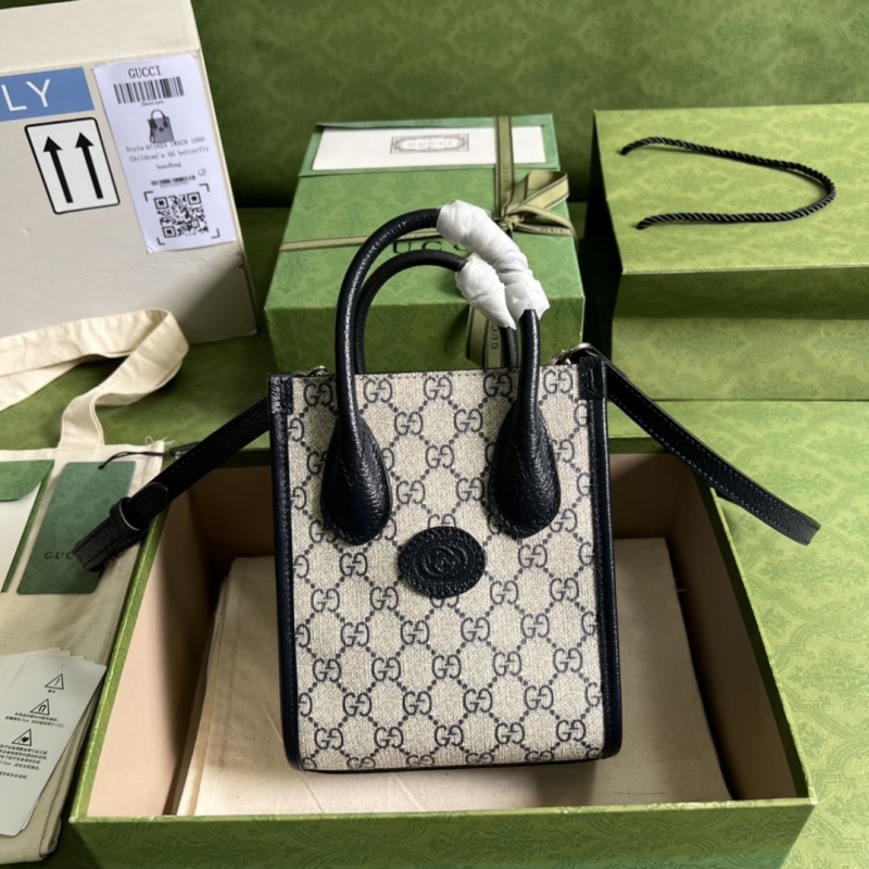 G*u*i top handle bags